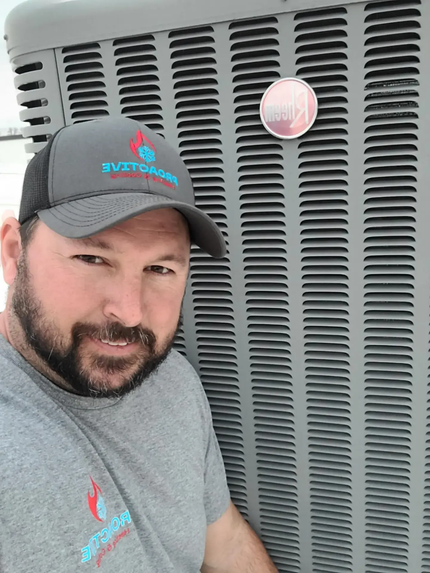 NATE-certified HVAC technician performing AC maintenance on Trane system in Claremore Oklahoma