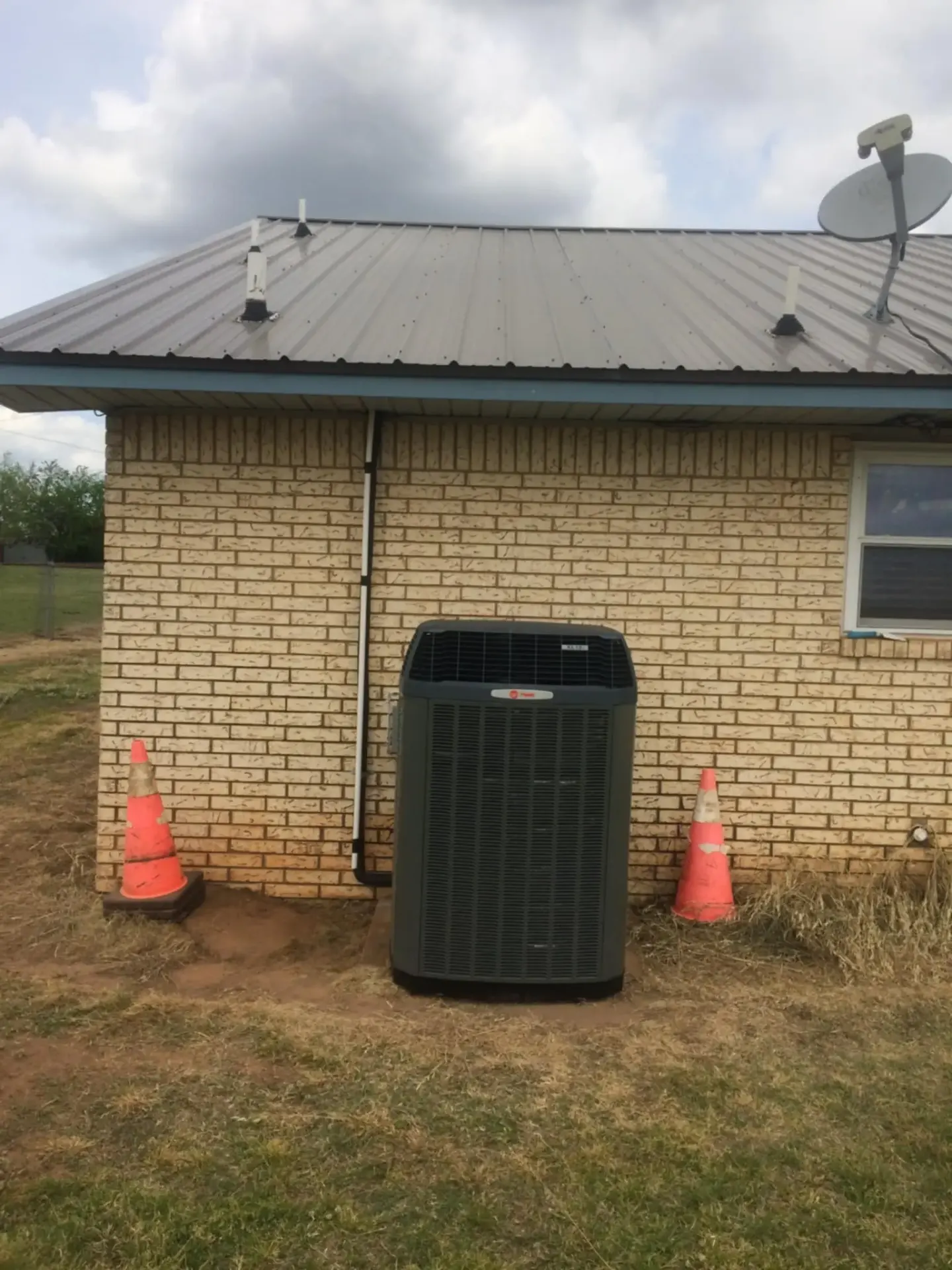 Residential Heat Pump Installation Rogers County Oklahoma Heat pump outdoor unit installation for Claremore Oklahoma residential home